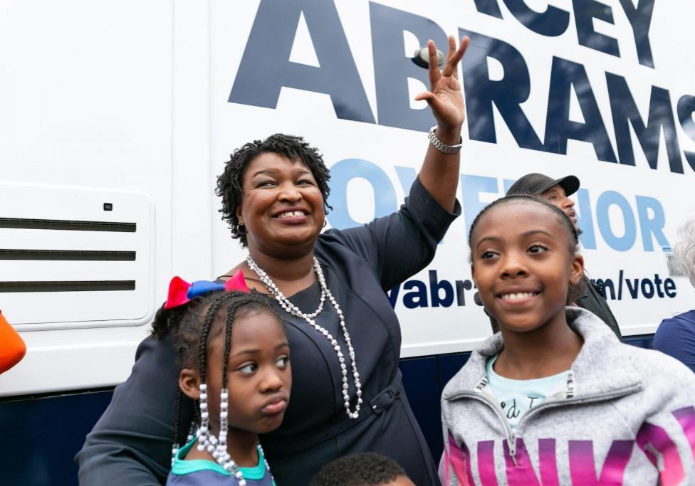 Portrait of Stacey Abrams with two children